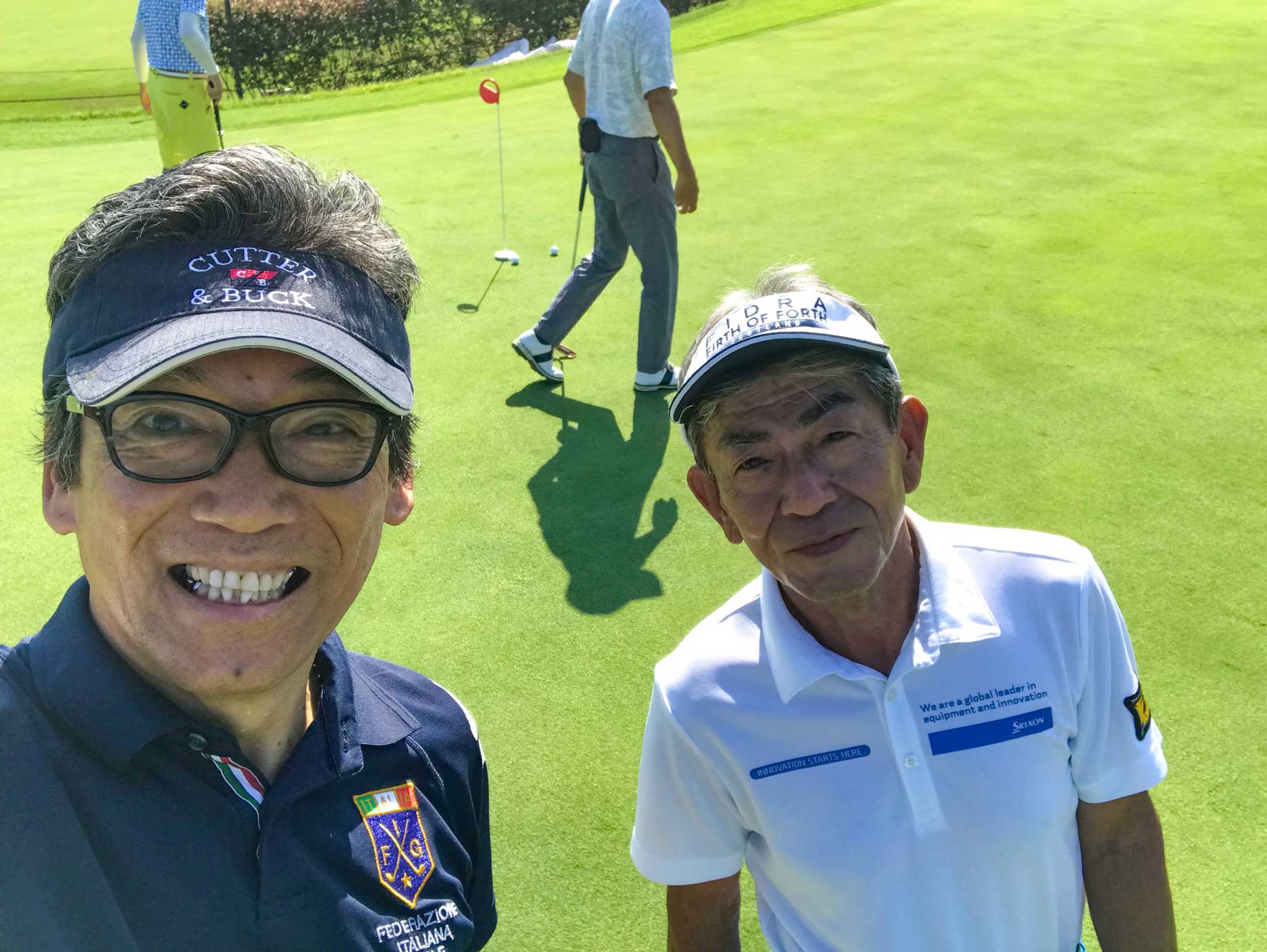 関西ゴルフサークル セブンエイトの湯浅光一と平野さんの写真