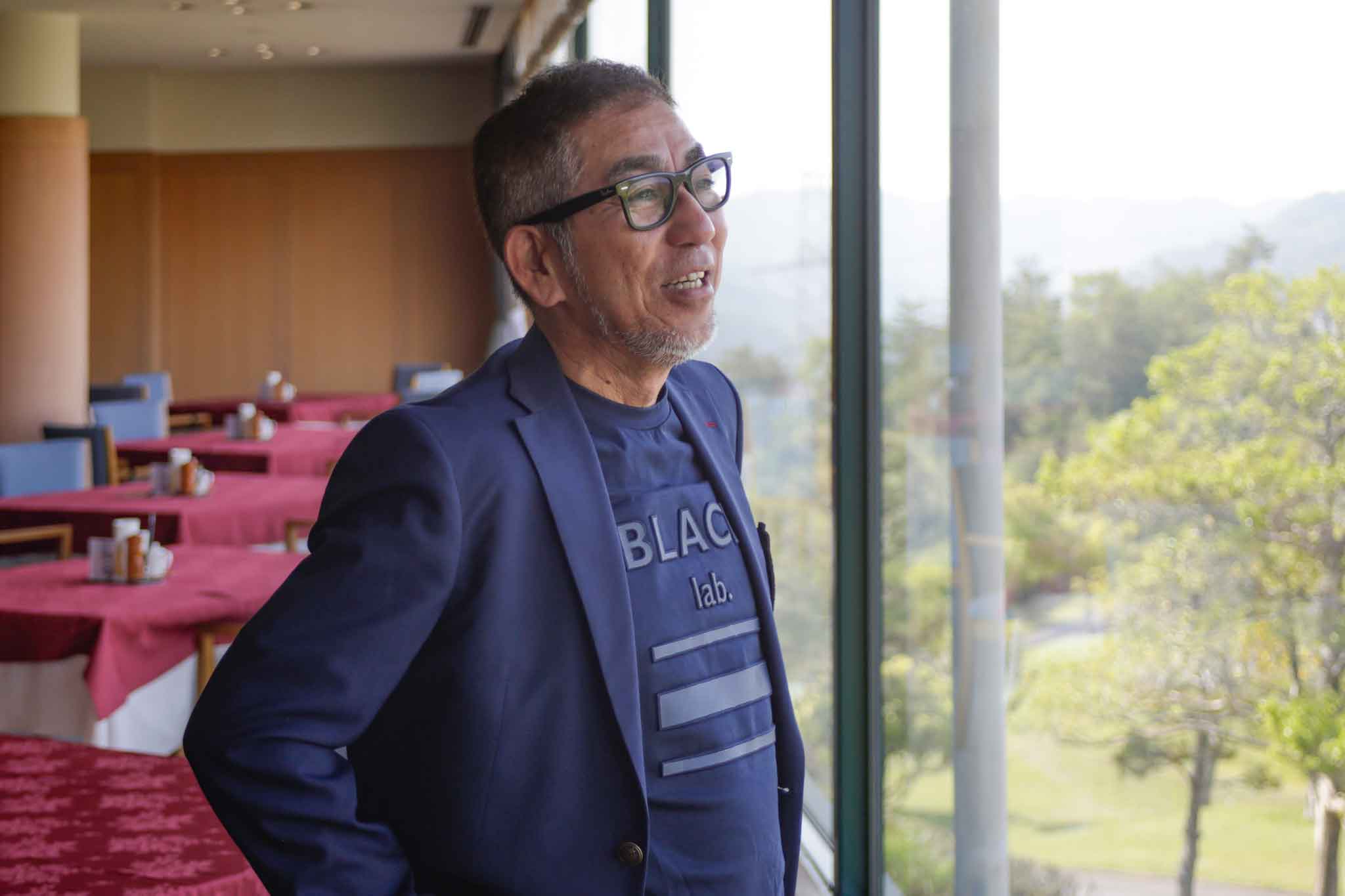 インタビューに答える関西ゴルフサークル セブンエイトの森田雅直さん