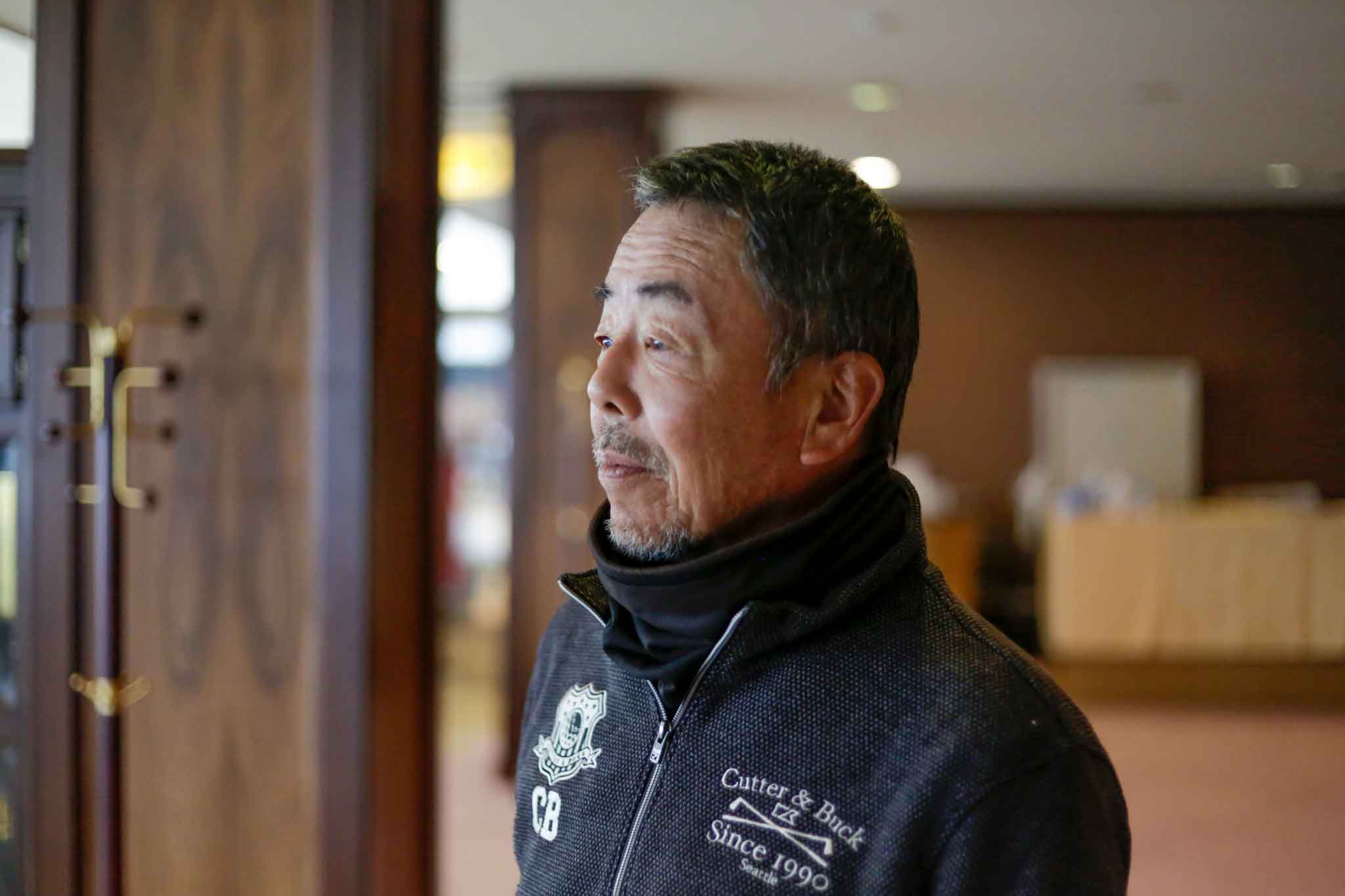 インタビューに答える関西ゴルフサークル セブンエイトの大西均さん